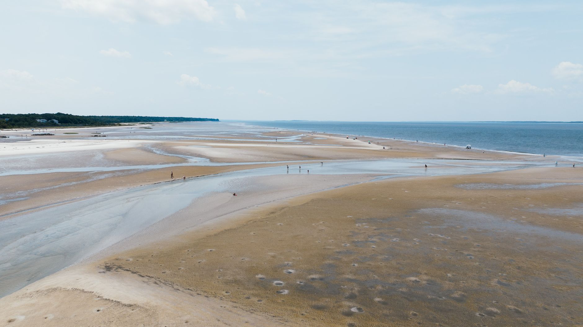 Aerial view of the serene and expansive beach at Hilton Head Island, South Carolina.
