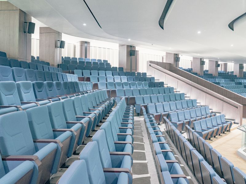 Modern cinema auditorium with tiered seating