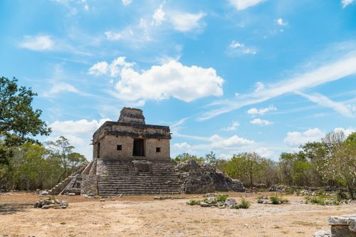 Free Explore the historic Mayan temple at Dzibilchaltún, Yucatan, under a vibrant blue sky. Stock Photo