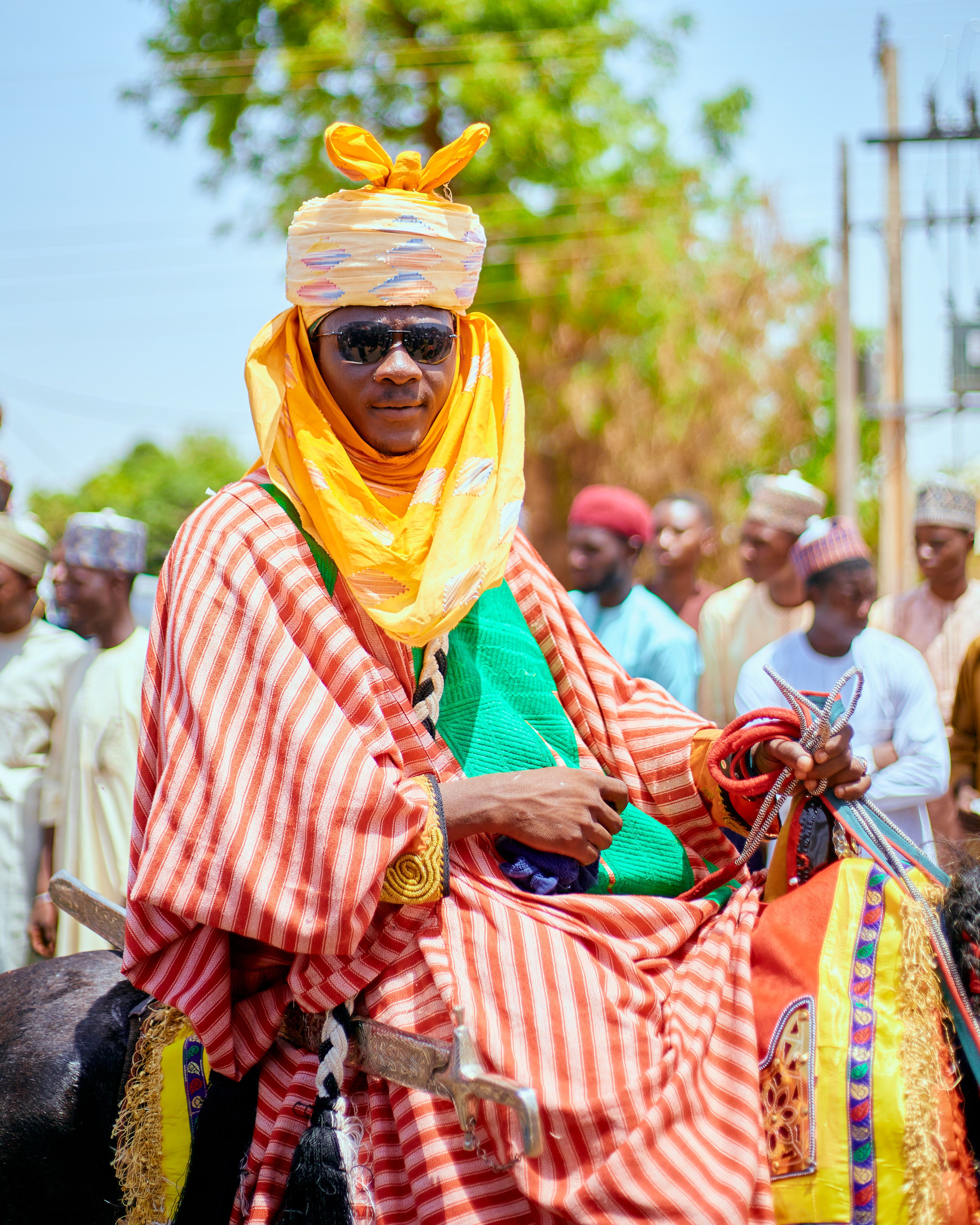 Colorful traditional attire worn during a cultural festival, depicting rich heritage and style.