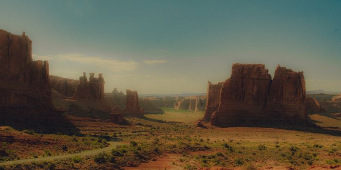 Explore the mesmerizing red rock landscape of Moab, Utah under a breathtaking morning sky.