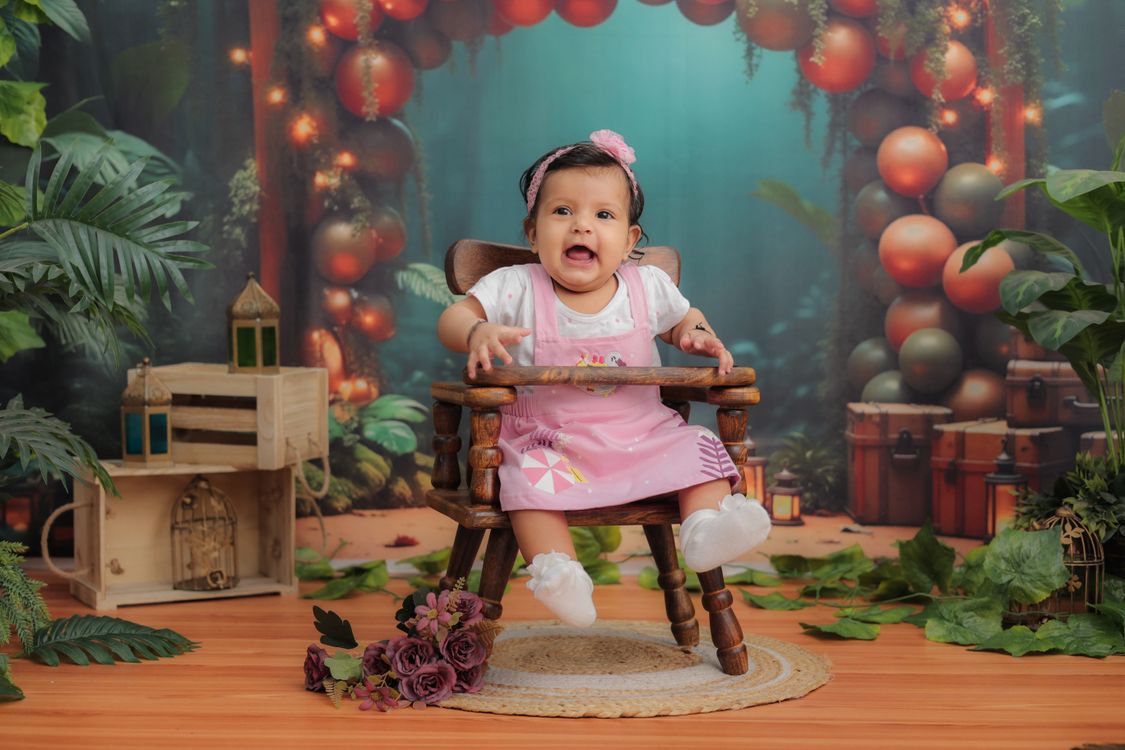 Adorable Baby in Fantasy-Themed Indoor Setting · Free Stock Photo