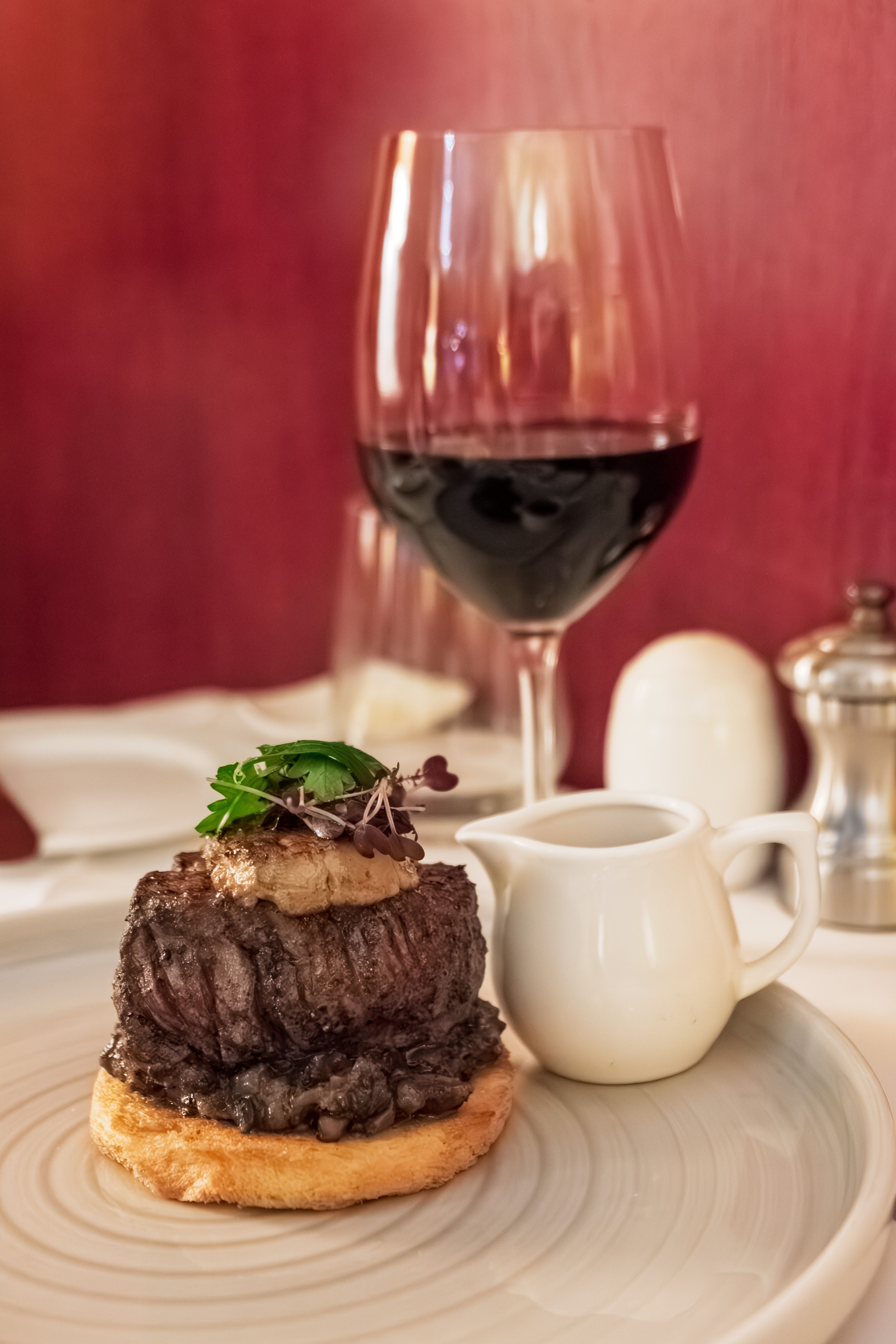 Gourmet steak dinner with red wine