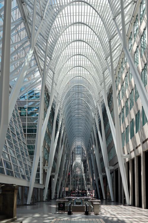 Free Stunning architectural view of Brookfield Place, Toronto. Symmetrical design with glass and steel structures. Stock Photo