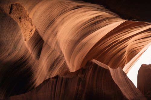 Free Stunning light and shadow play in Antelope Canyon, showcasing natural sandstone beauty. Stock Photo