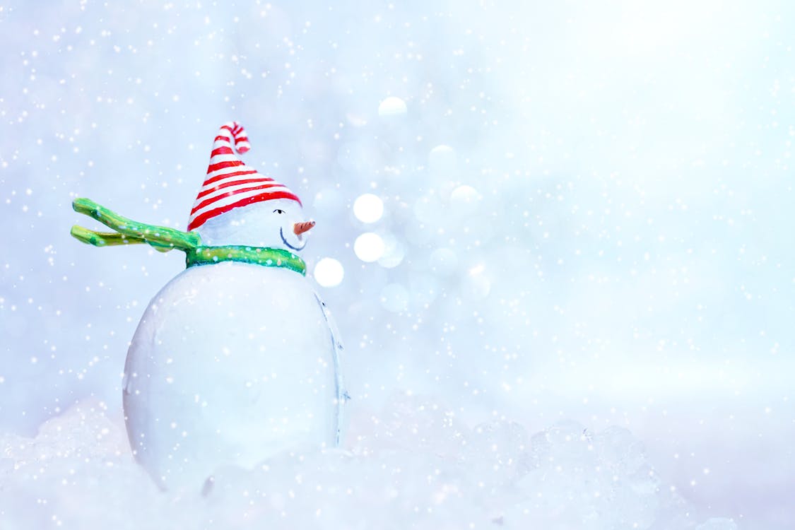 Free Snowman With Red Hat Stock Photo