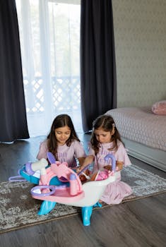 Two girls engaged in play with a toy beauty salon set in a cozy bedroom.