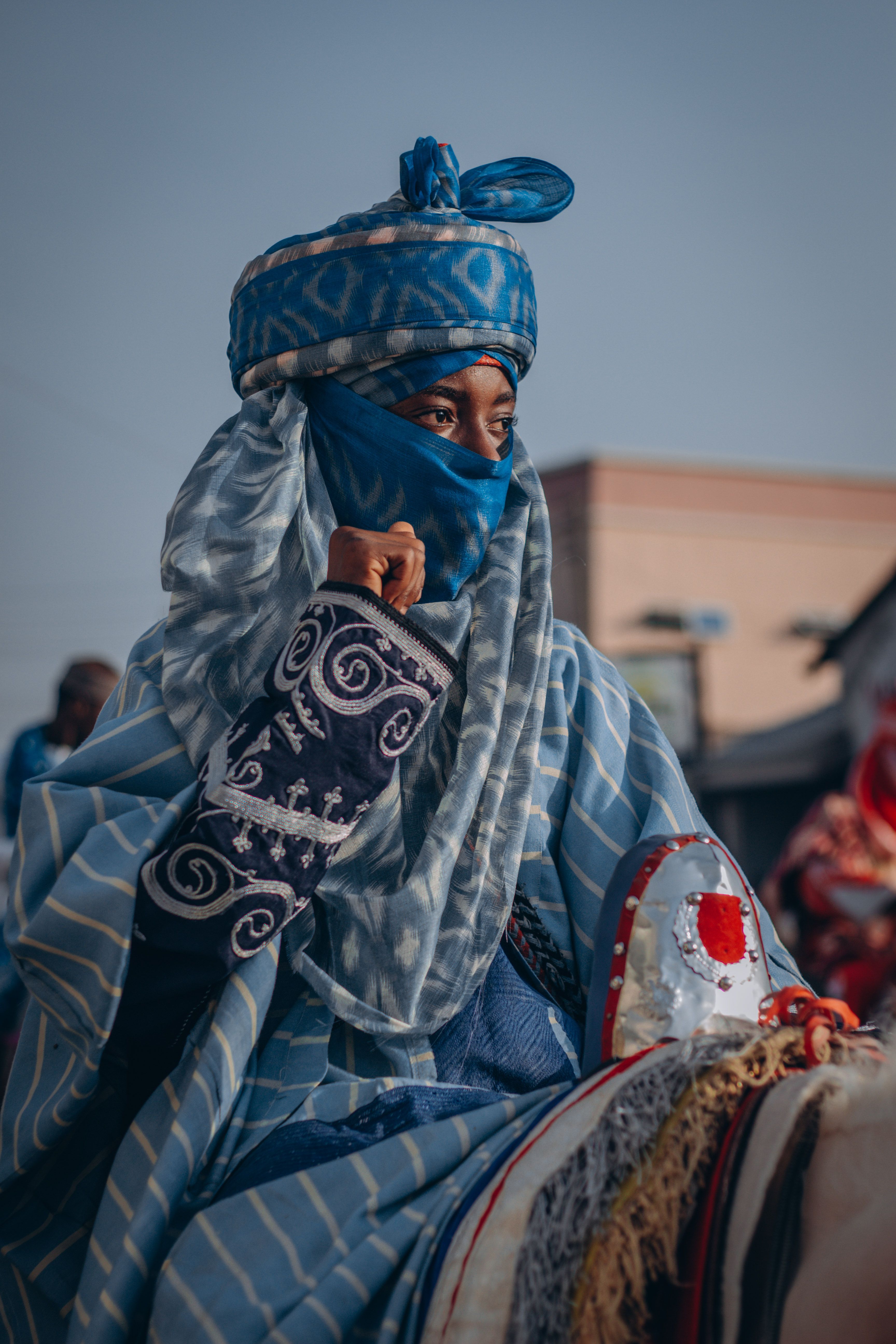 Portrait of Man Holding Spear in Traditional Clothing · Free Stock Photo