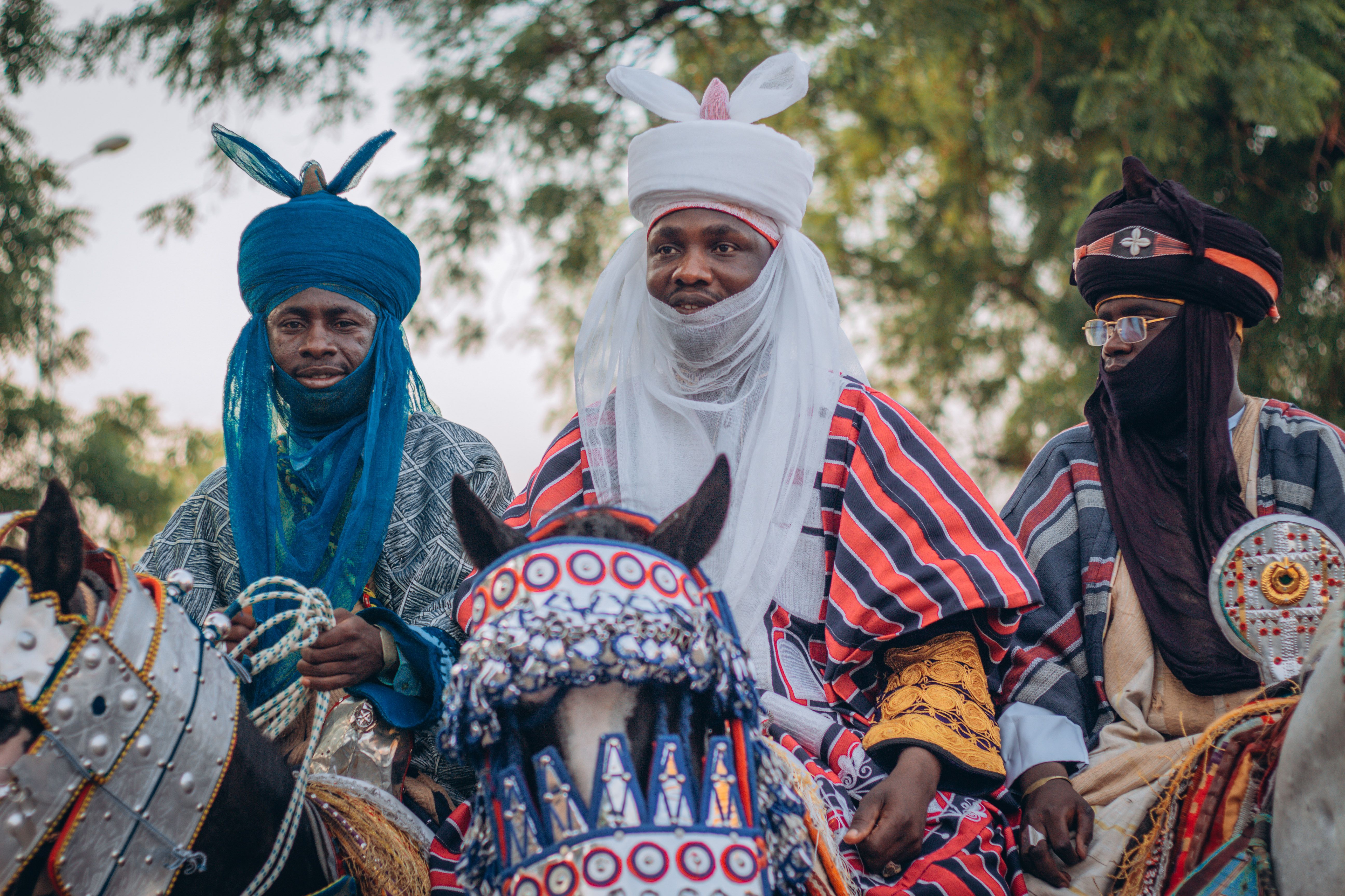 Traditional Horse Riders in Colorful Attire · Free Stock Photo
