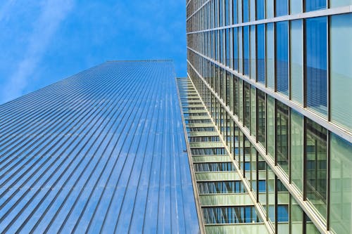 Free Low Angle View of Office Building Against Sky Stock Photo