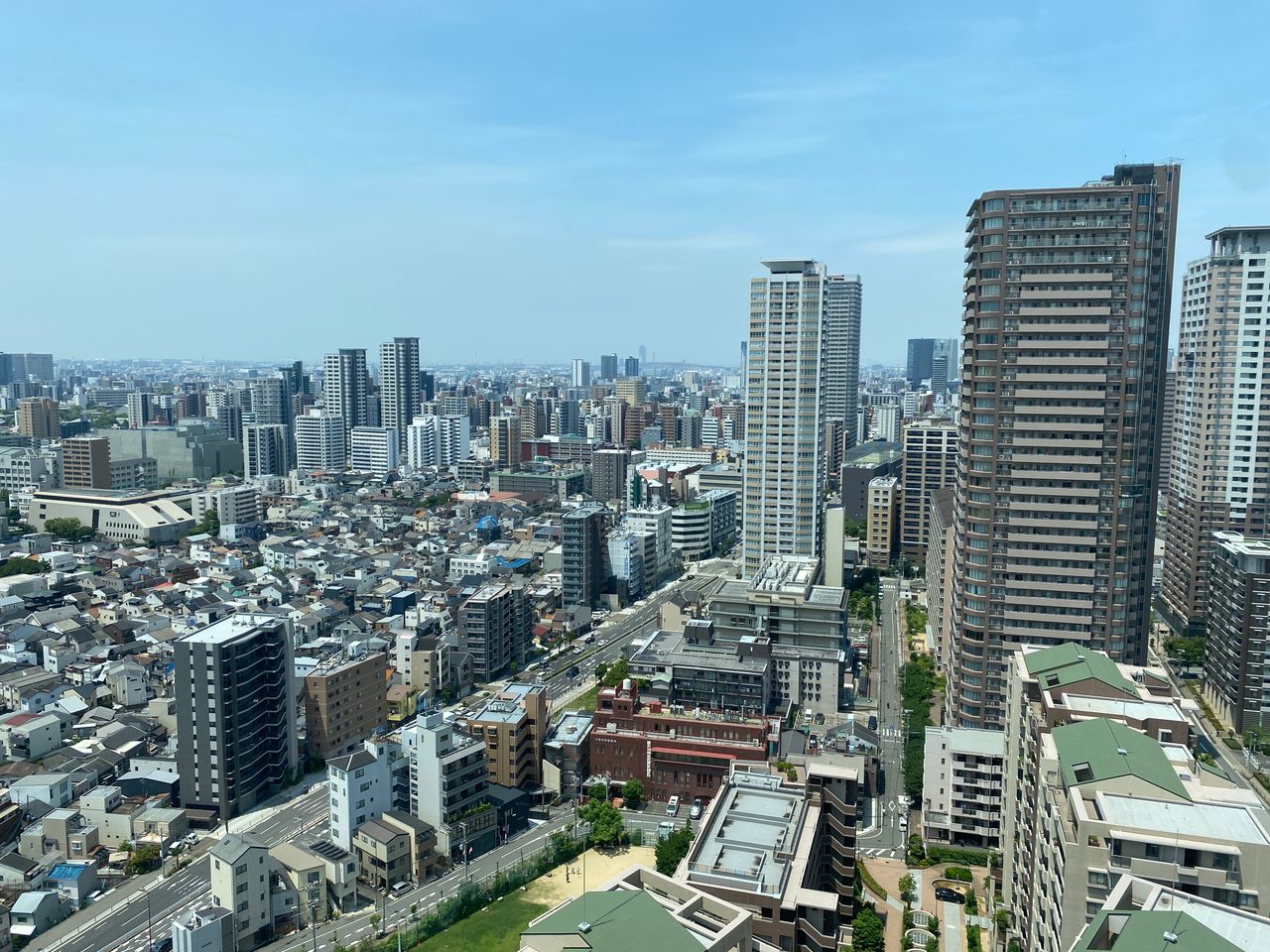 high angle shot of tokyo s urban skyline with skyscrapers and resident