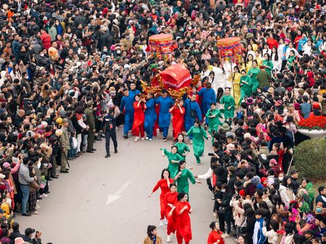 A lively scene from the Ky Cung Ta Phu Temple Festival in Lạng Sơn, Vietnam, showcasing cultural traditions.