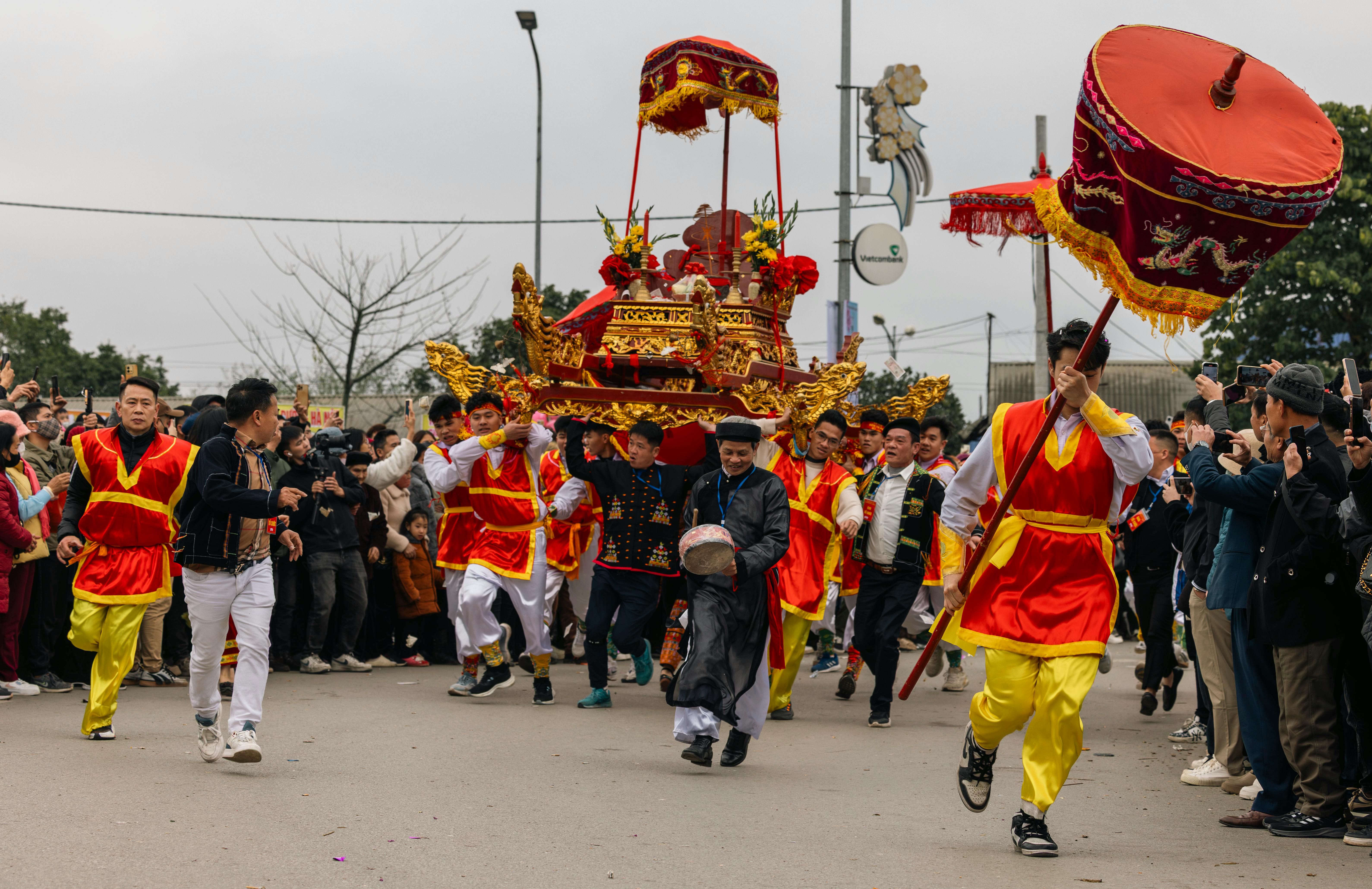 Traditional festival celebration in Lạng Sơn, Vietnam with colorful costumes and joyful crowd.