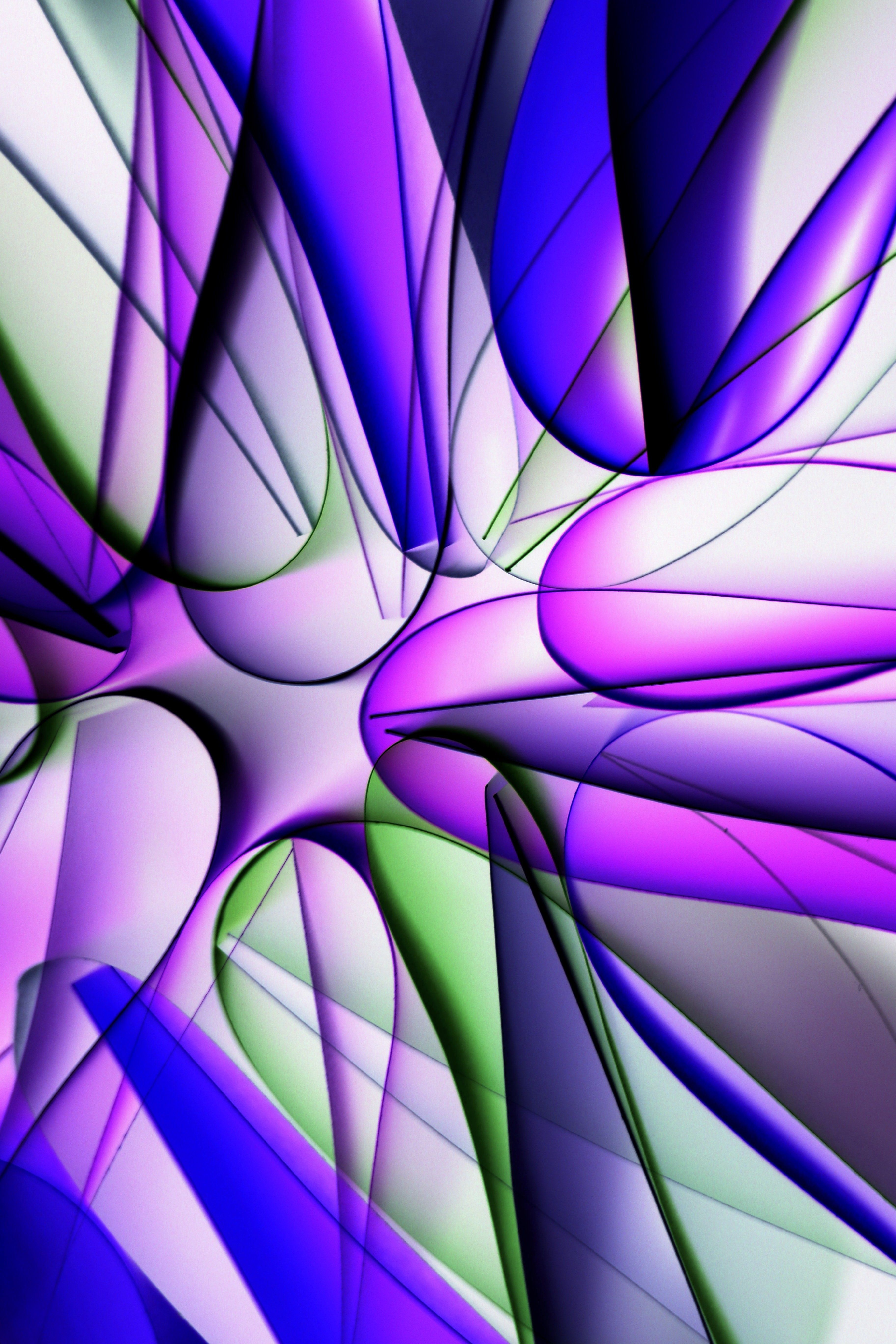 Colorful abstract art showcasing vibrant geometric patterns with purple, blue, and green hues.
