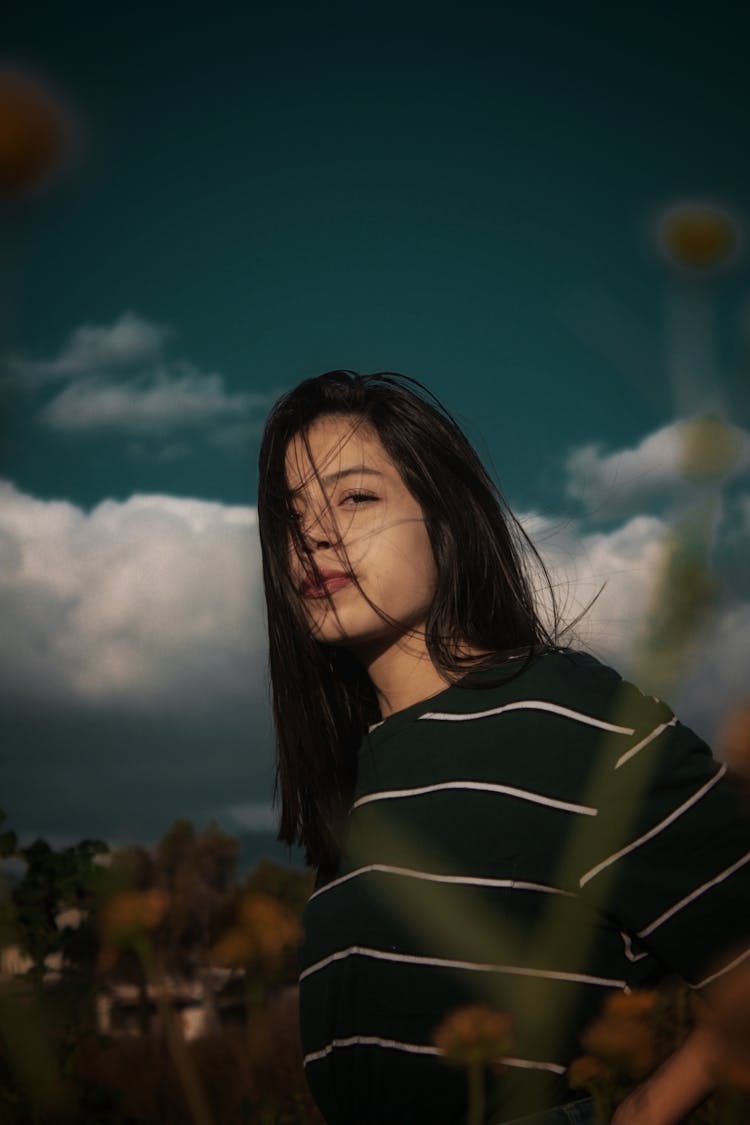 Woman Looking At Her Left Near Plants