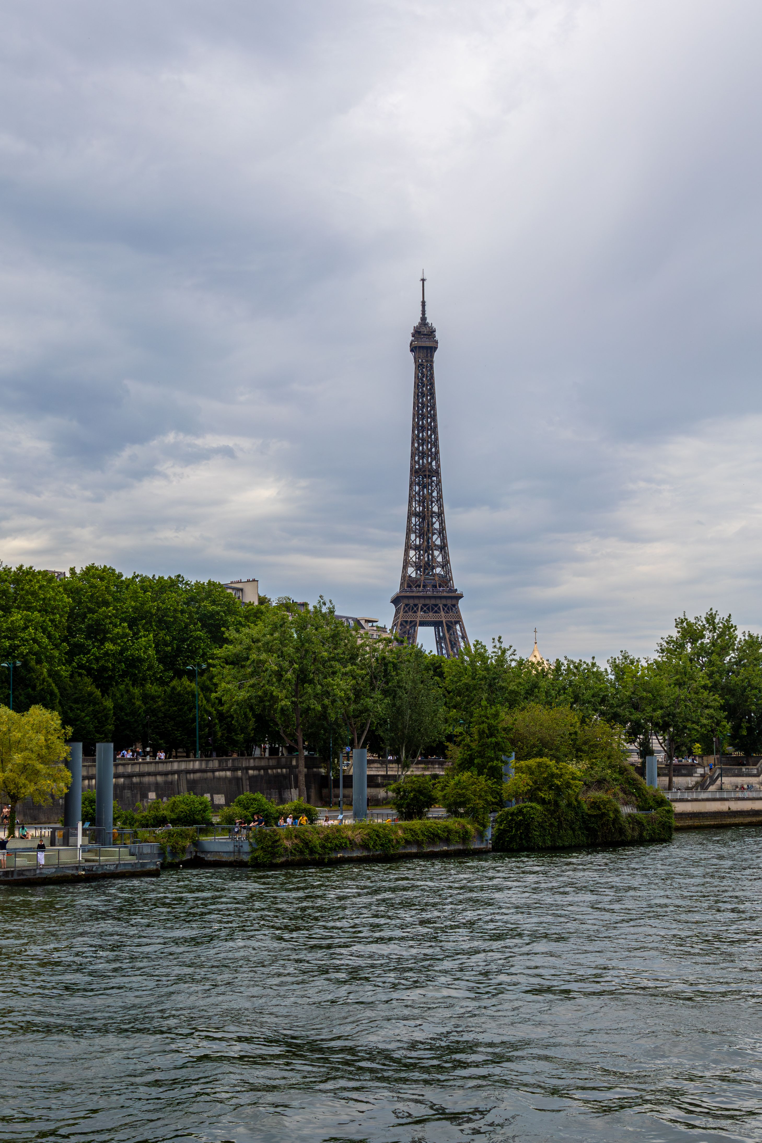 Coastal city washed by water of rippling river · Free Stock Photo