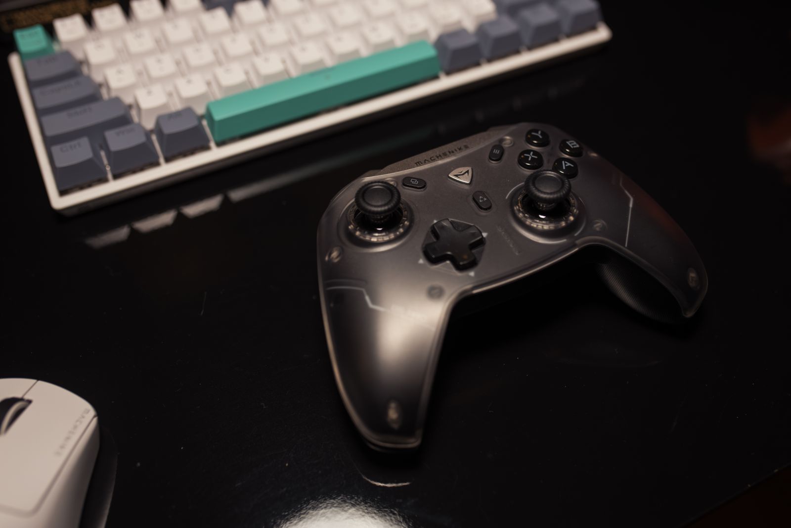 Gaming controller arranged on a modern desk with performance accessories