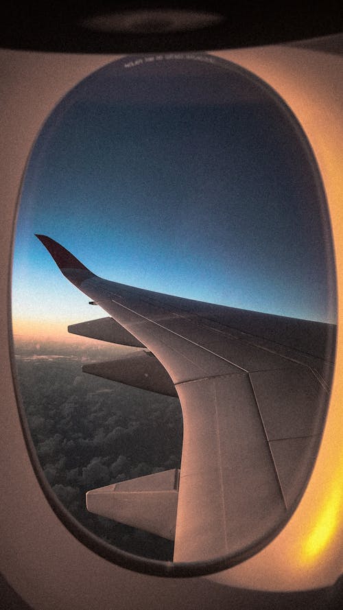 Free stock photo of airplane window, airplane wing, atmosphere