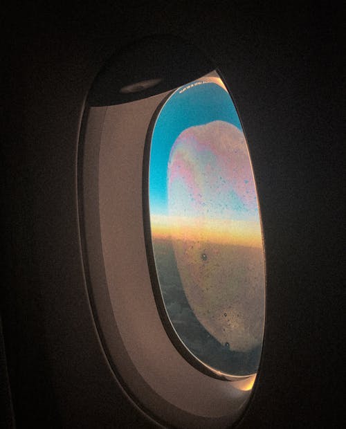 Free stock photo of airplane window, flight, frost on window