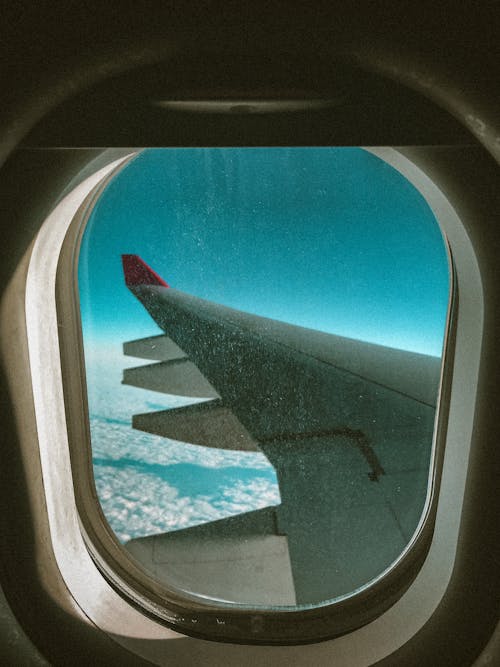 Foto d'estoc gratuïta de ambient, cel blau, finestra de l'avió
