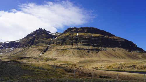 Free Breathtaking view of a rugged mountain under a blue sky in Iceland. Stock Photo