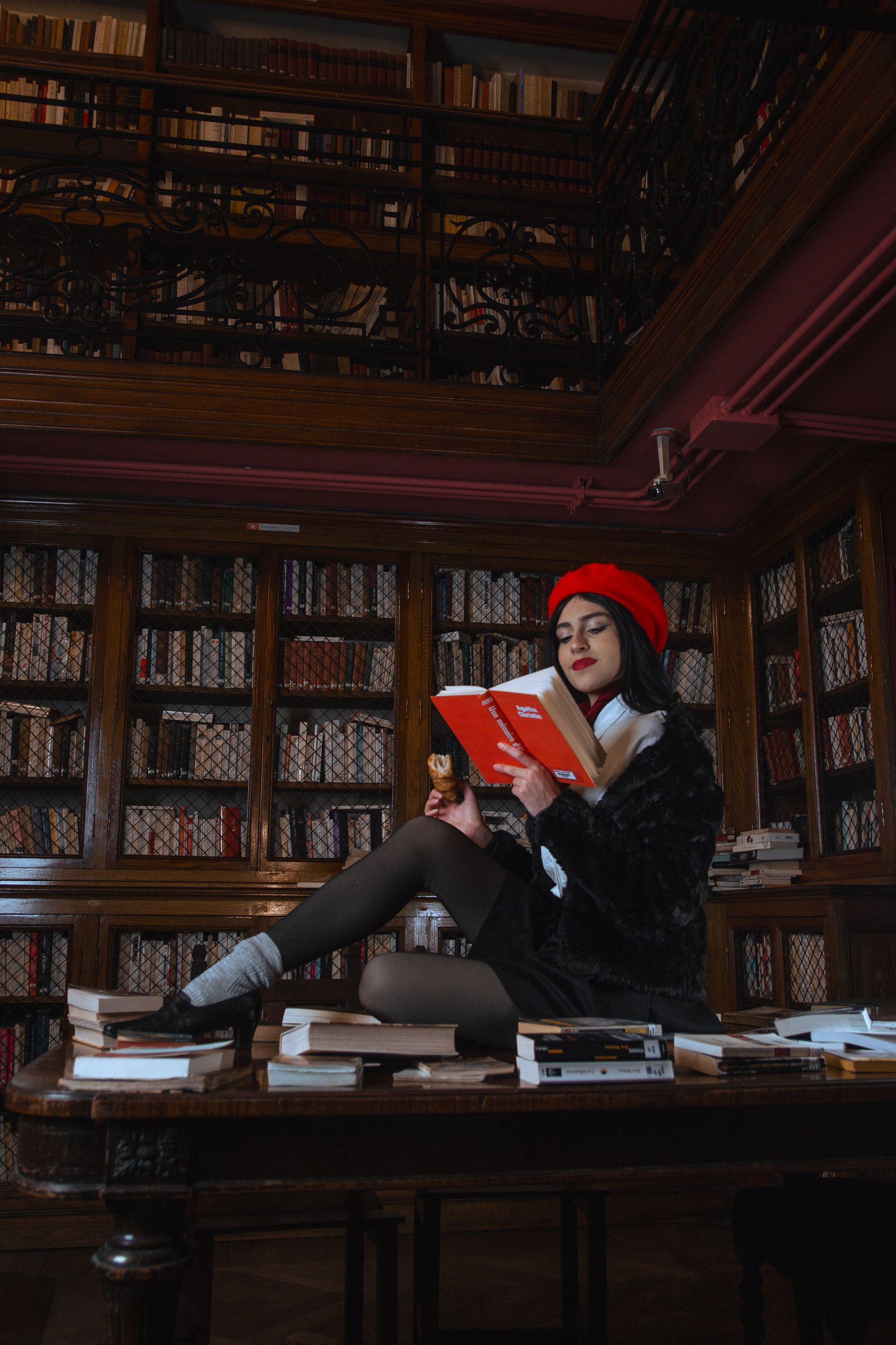 Woman Reading in Elegant Library Setting · Free Stock Photo