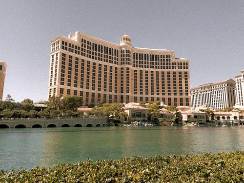 Free A view of the iconic Bellagio Hotel in Las Vegas with clear skies and reflection in the water. Stock Photo