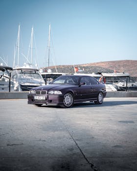 Elegant purple BMW car parked near Alaçatı Marina, showcasing luxury and style in Türkiye.