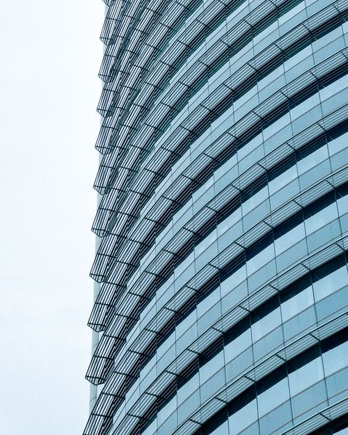 Free Close-up of modern glass facade showing architectural symmetry and design. Stock Photo
