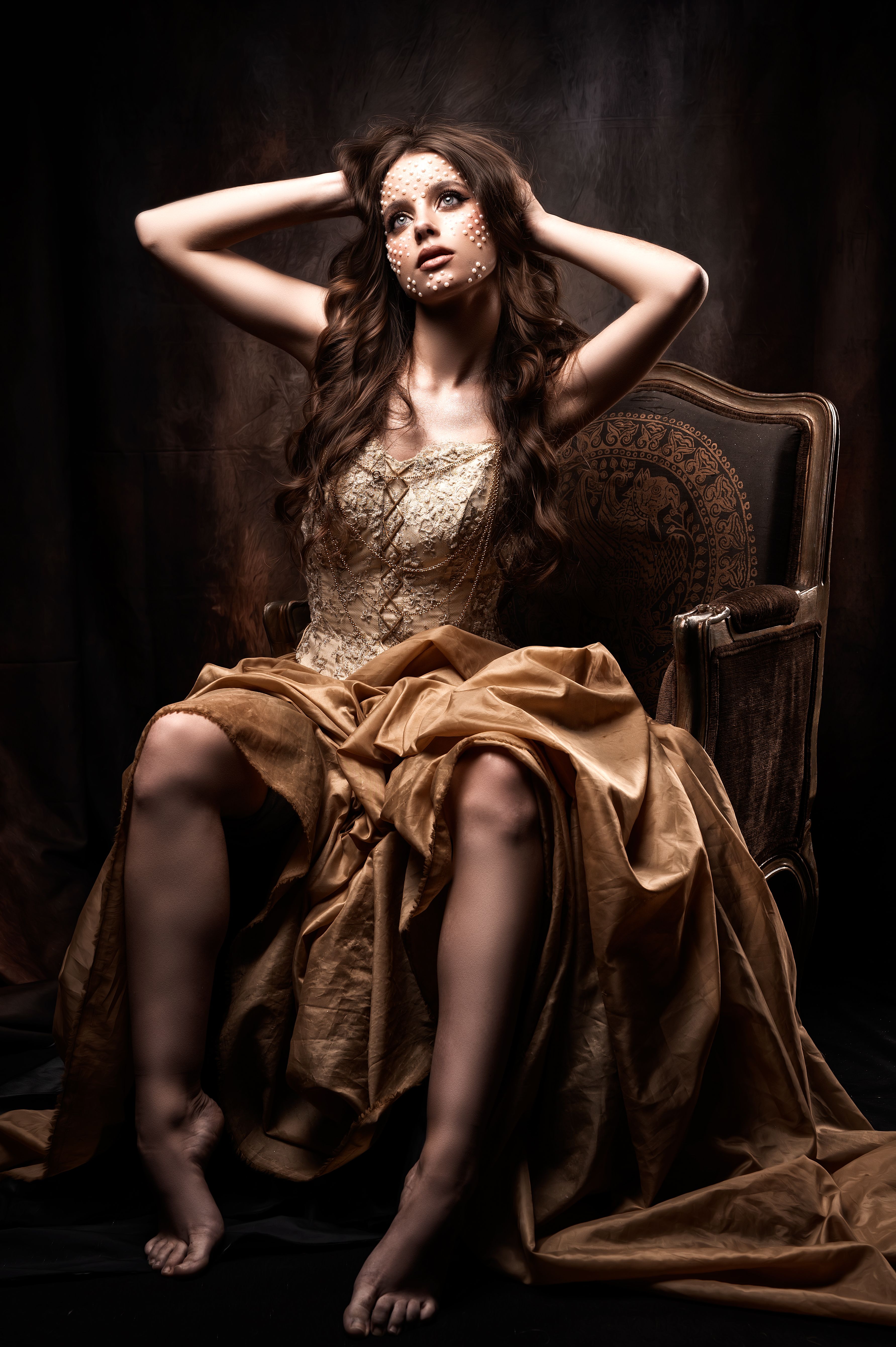 Elegant Woman in Vintage Gown Sitting on Chair · Free Stock Photo