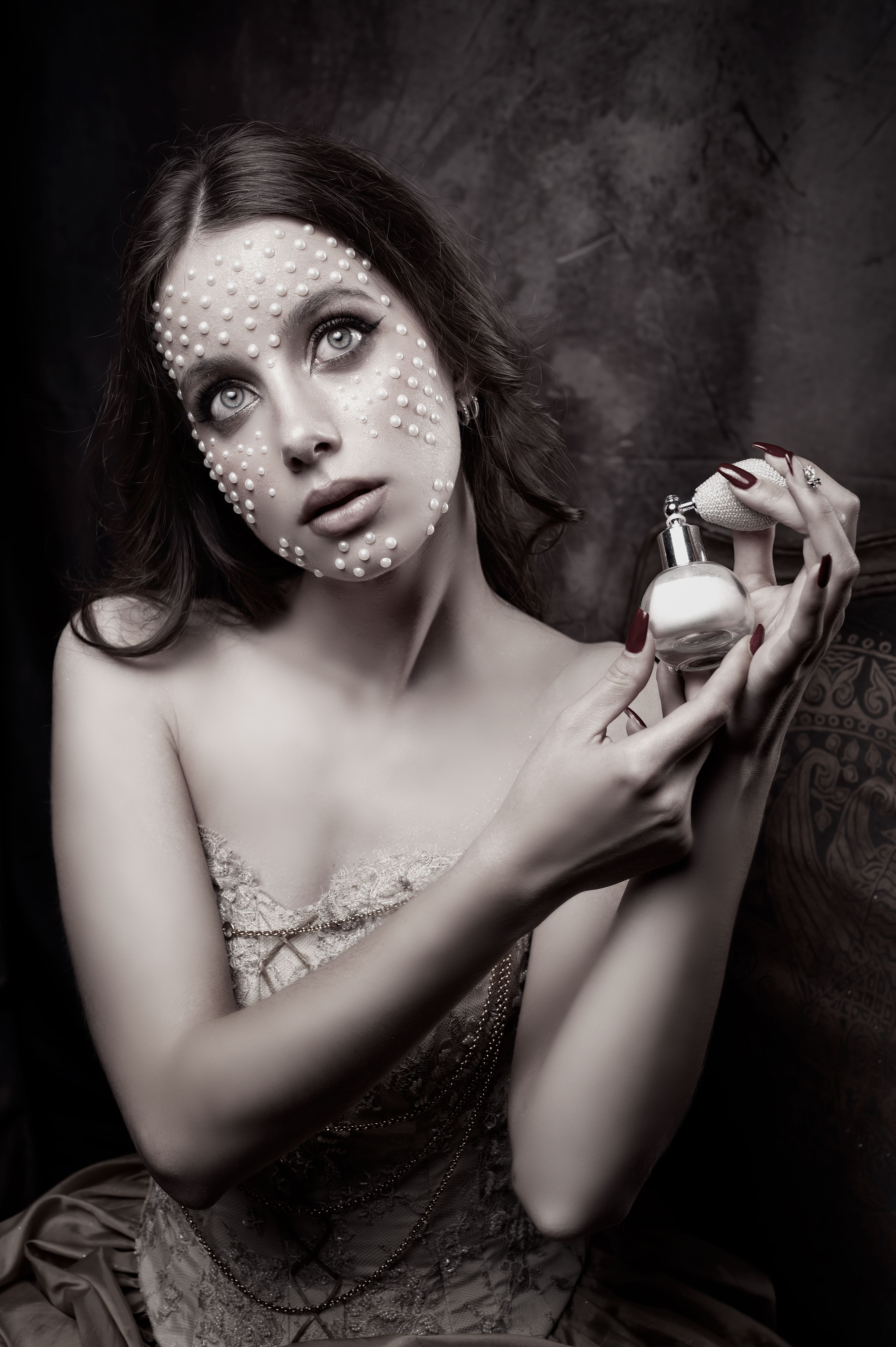 Artistic Portrait of Woman with Pearl Embellishments · Free Stock Photo