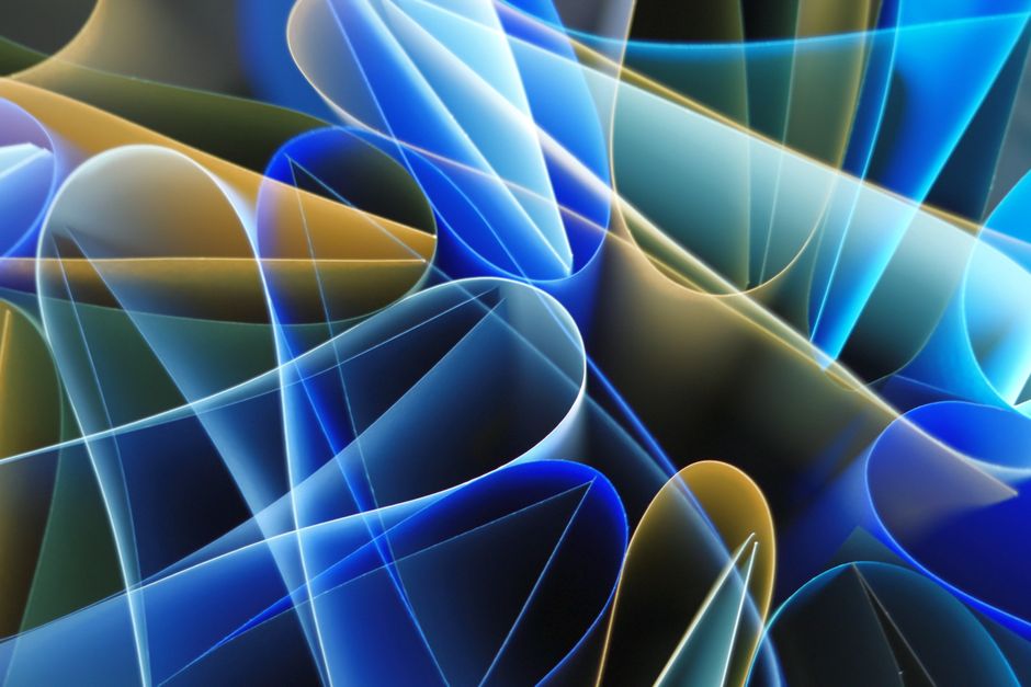 Dynamic abstract image of colorful light waves creating fluid shapes and vivid visual effects.
