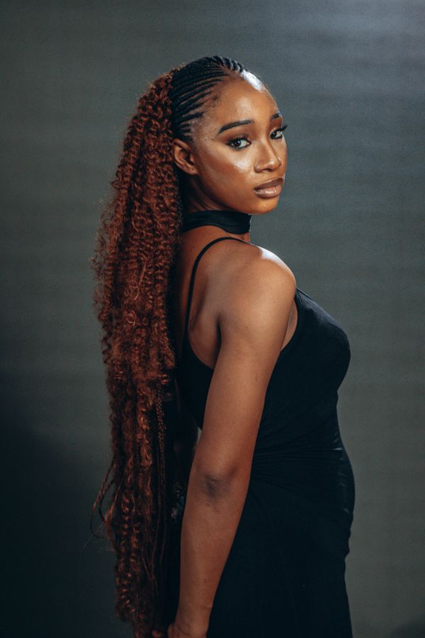 Long braided ponytail with wrapped sections