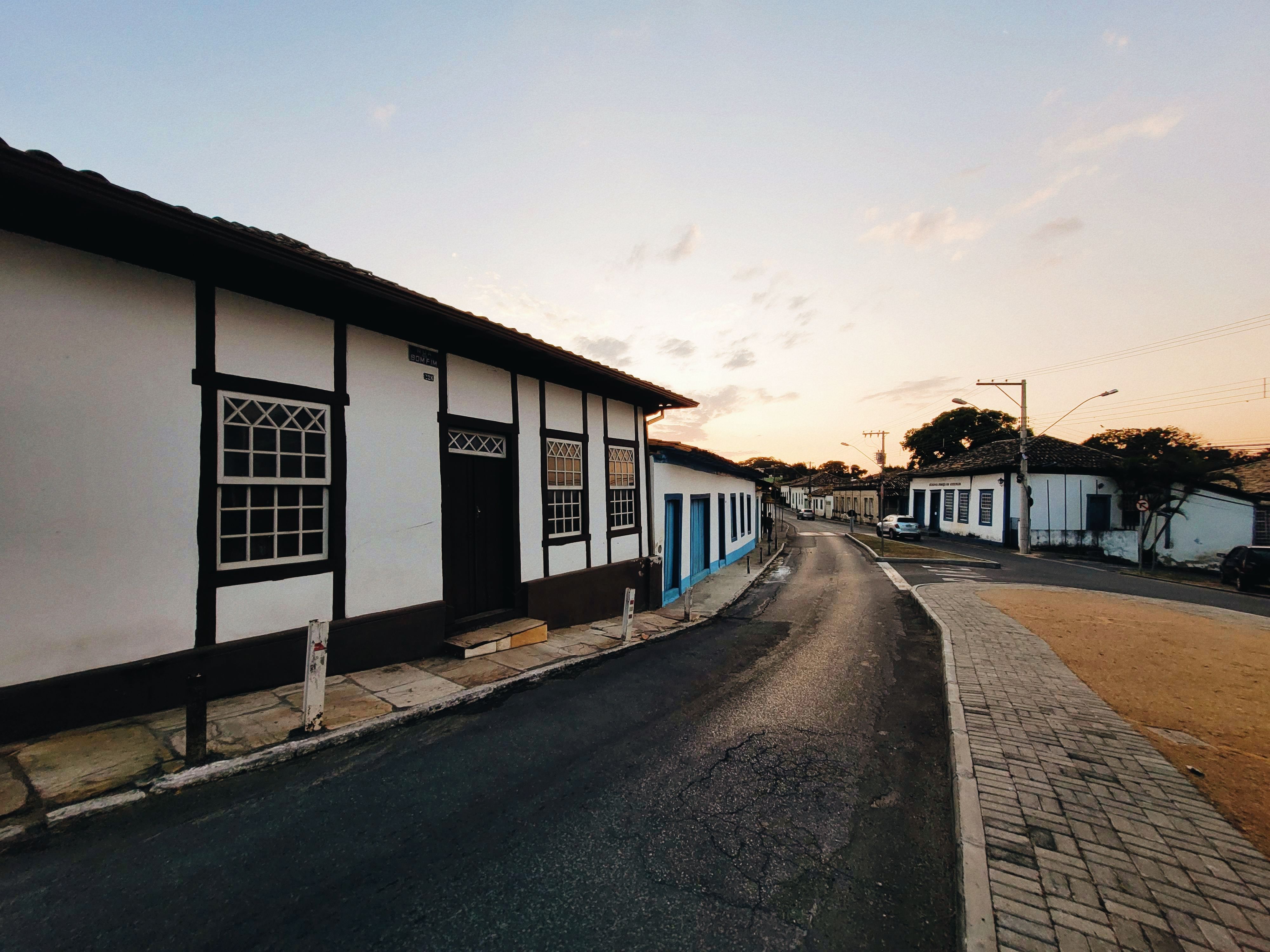 A cobbled street in the colonial town of Laguna at sunset, one of the best day trips from Florianópolis