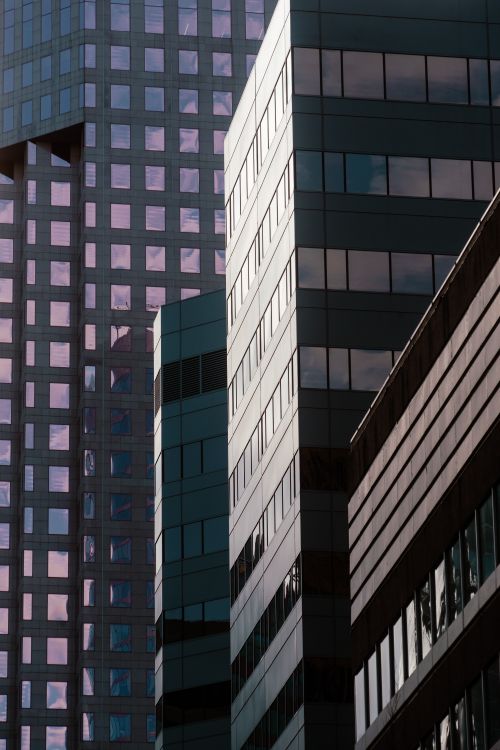 Free Close-up view of modern architectural skyscrapers with reflections in Vancouver, Canada. Stock Photo
