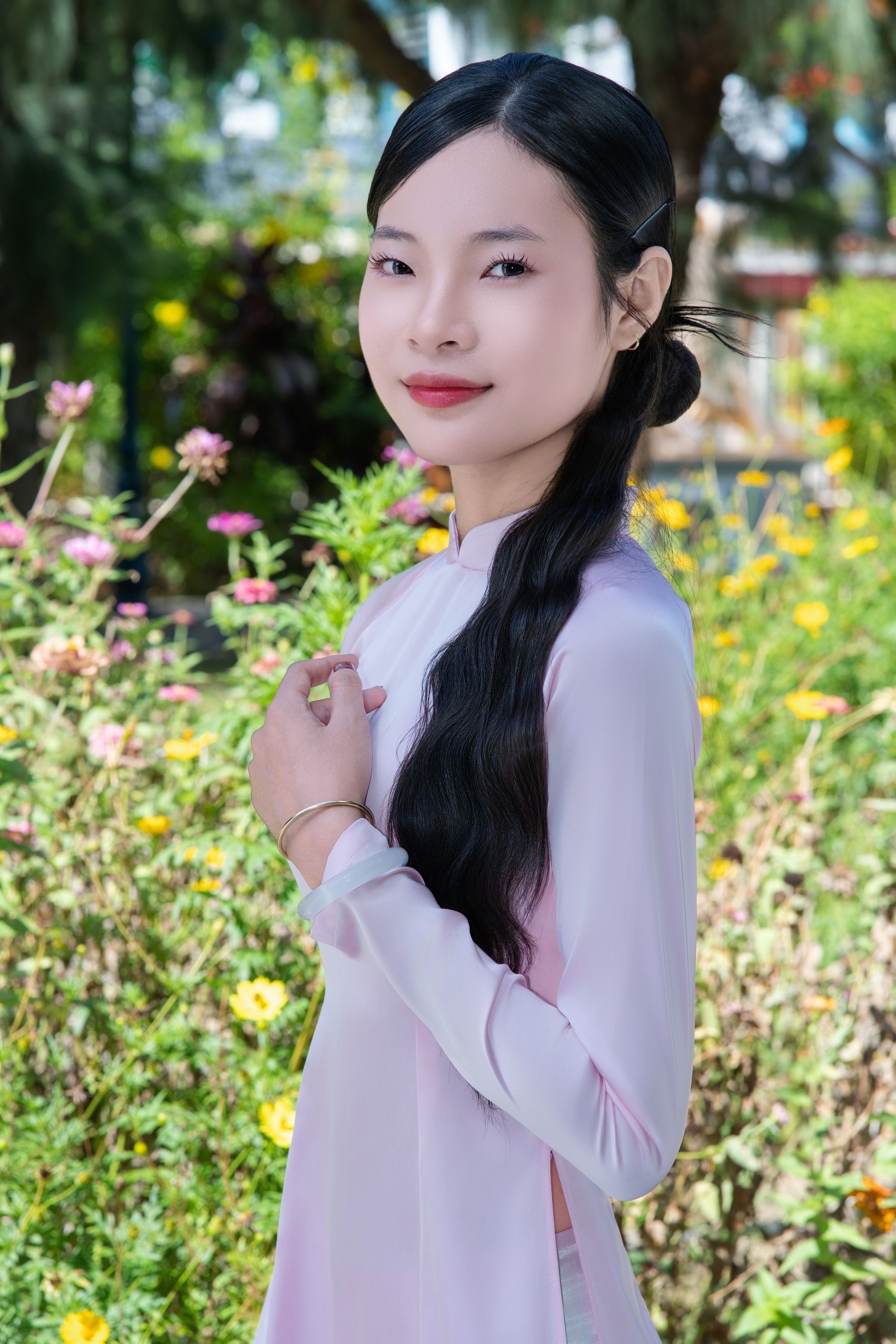 Elegant Woman in Traditional Dress Outdoors · Free Stock Photo