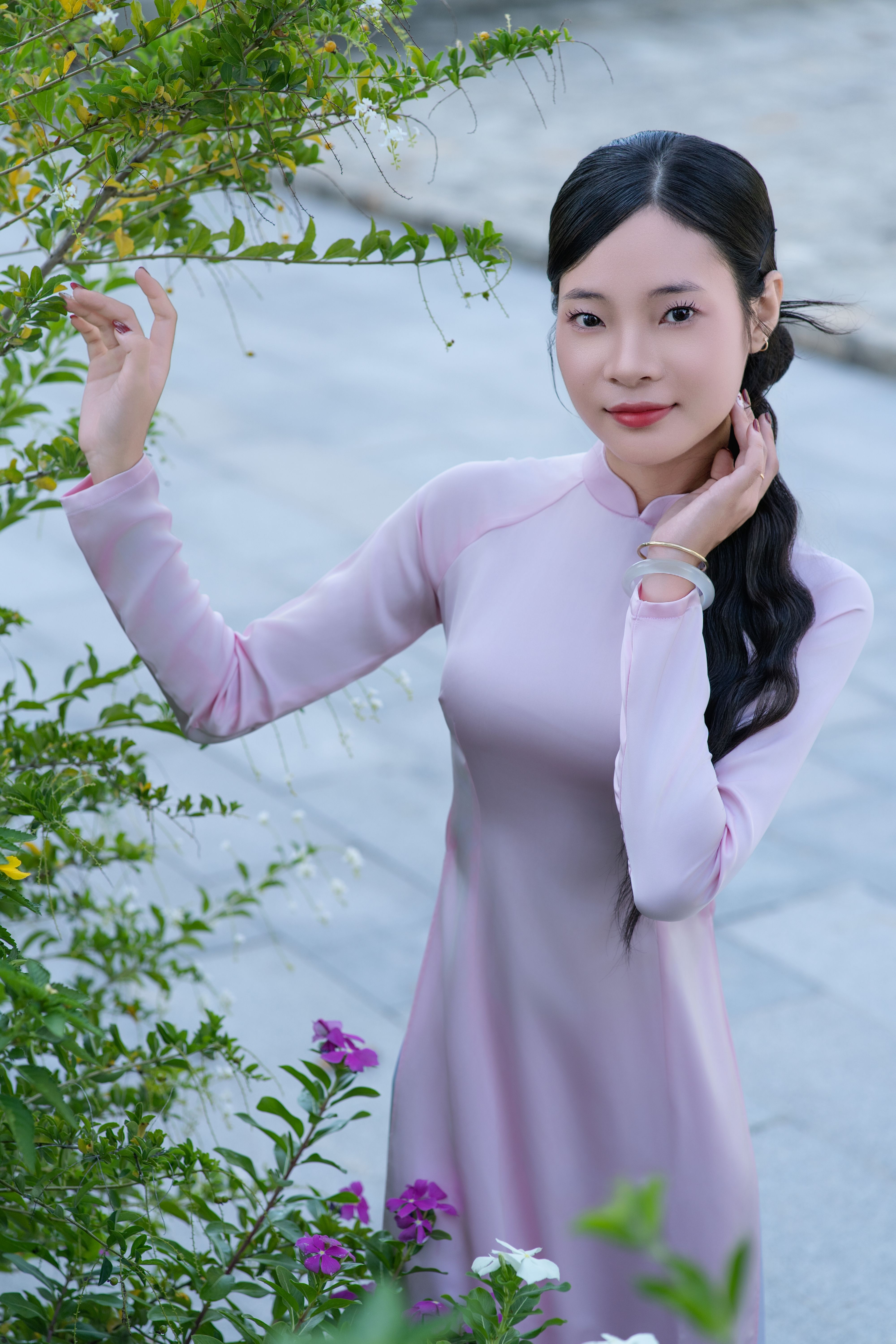 Elegant Woman in Traditional Pink Dress Outdoors · Free Stock Photo