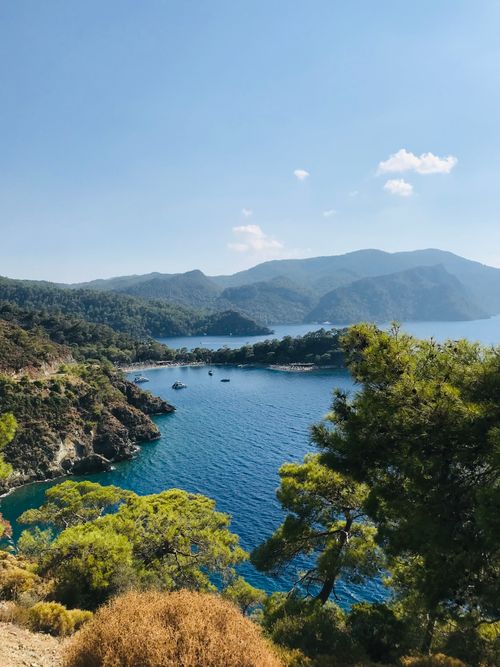 Free Stunning aerial view of the Turquoise Coast in Muğla, Türkiye, with lush greenery and calm seas. Stock Photo