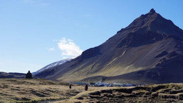 A breathtaking view of an Icelandic mountain under a clear blue sky, perfect for nature and travel enthusiasts.