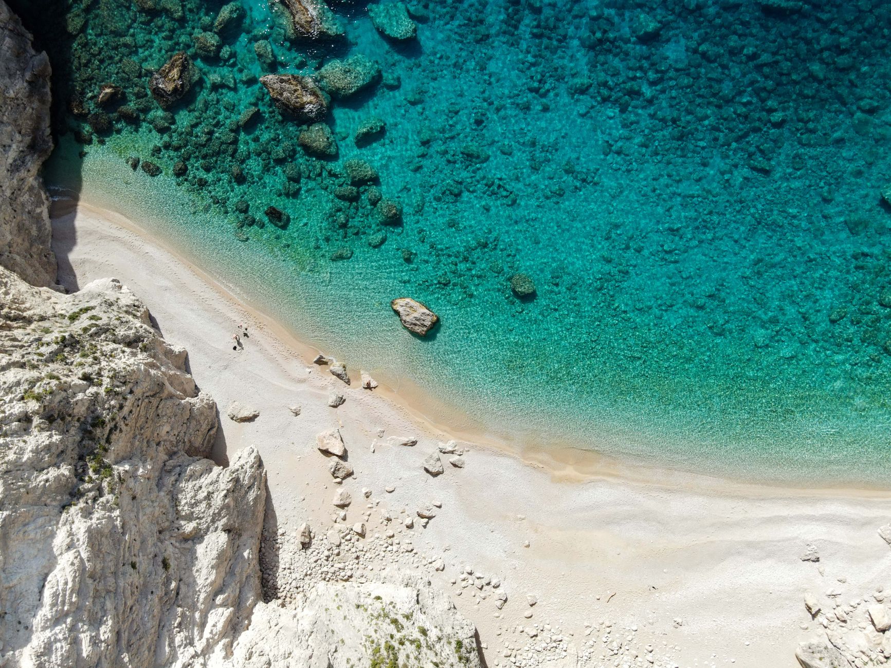 Stunning aerial view of a pristine beach and turquoise waters in Zante, Greece, showcasing natural beauty.