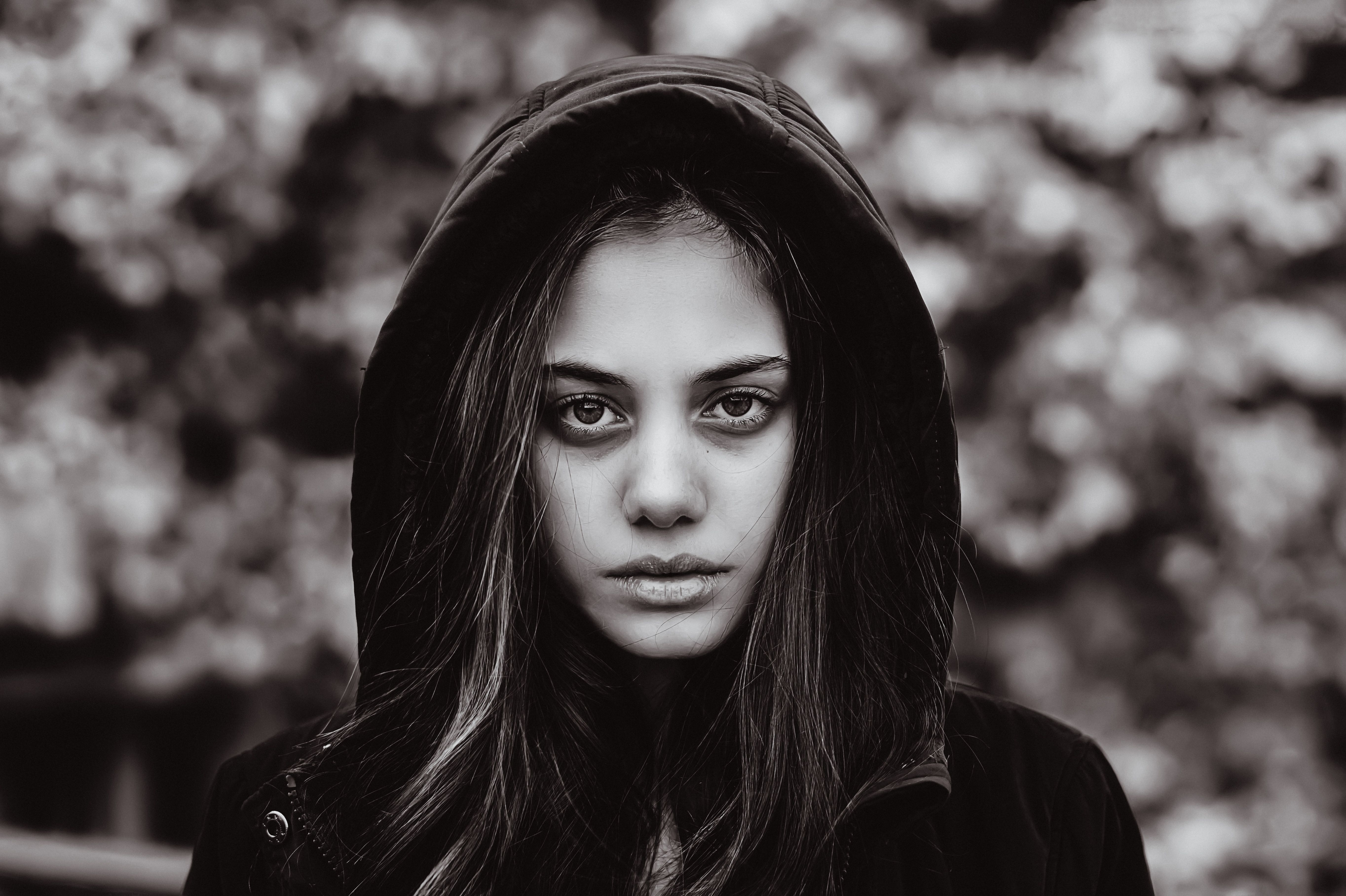Black and White Portrait of Woman with Moody Expression · Free Stock Photo