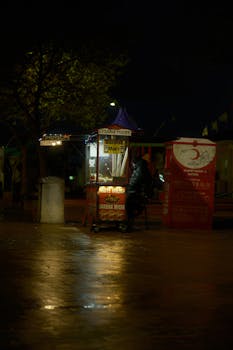 Outdoor street food stall at night in Degirmendere, Türkiye.