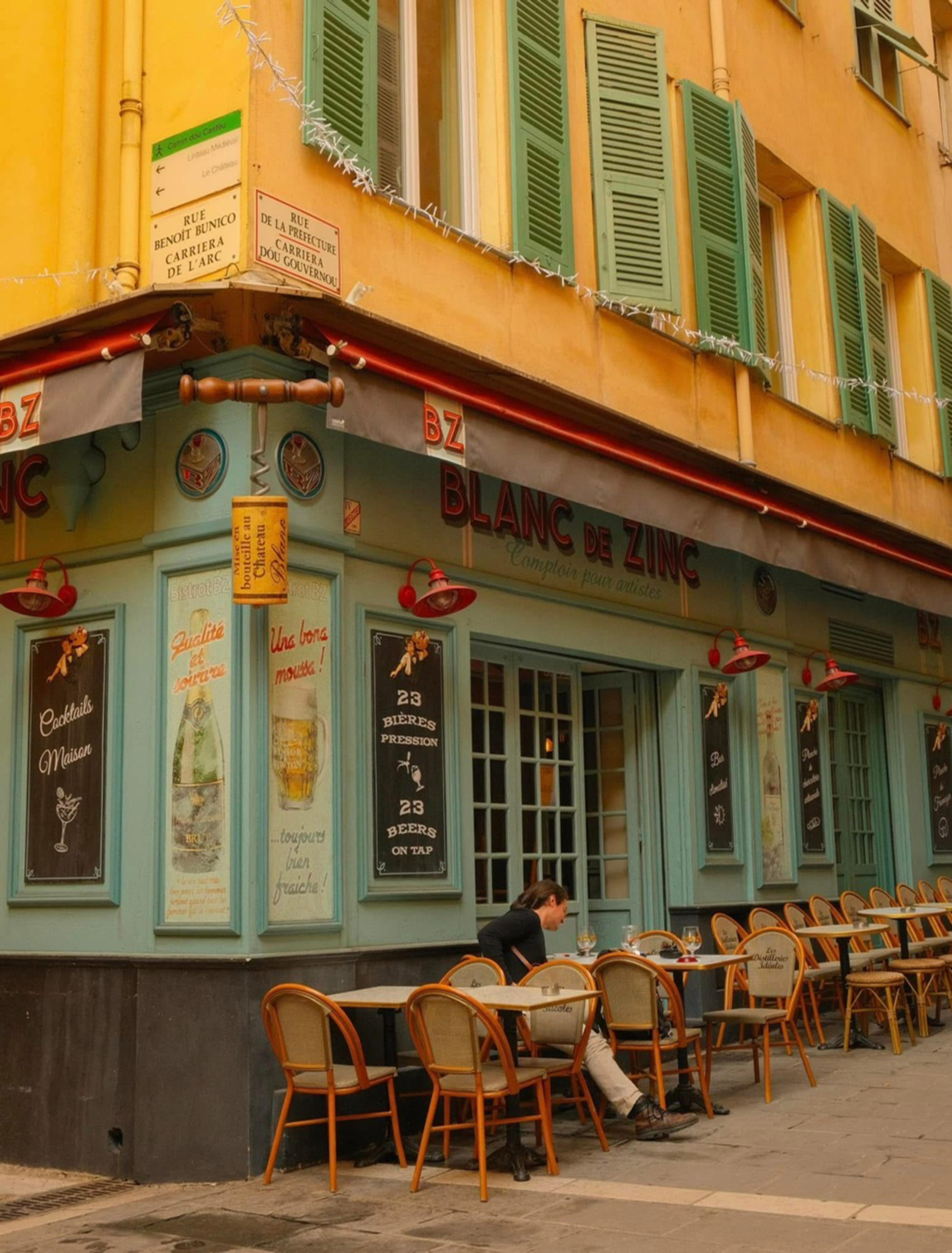 Charming French Cafe Corner in Warm Daylight · Free Stock Photo