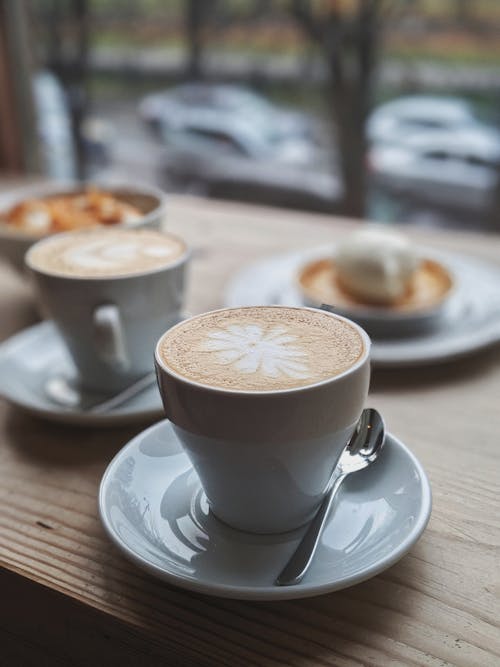 Free Selective Focus Photography of Coffee With Latte Art Stock Photo