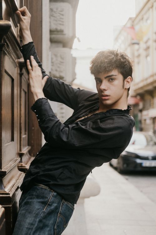 Free Captivating street portrait of a young male in İstanbul, embodying urban style and energy. Stock Photo