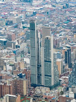 Aerial view showcasing the cityscape of Bogotá with prominent skyscrapers.