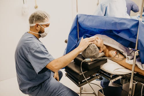 Foto d'estoc gratuïta de atenció sanitària, cirurgià, hospital