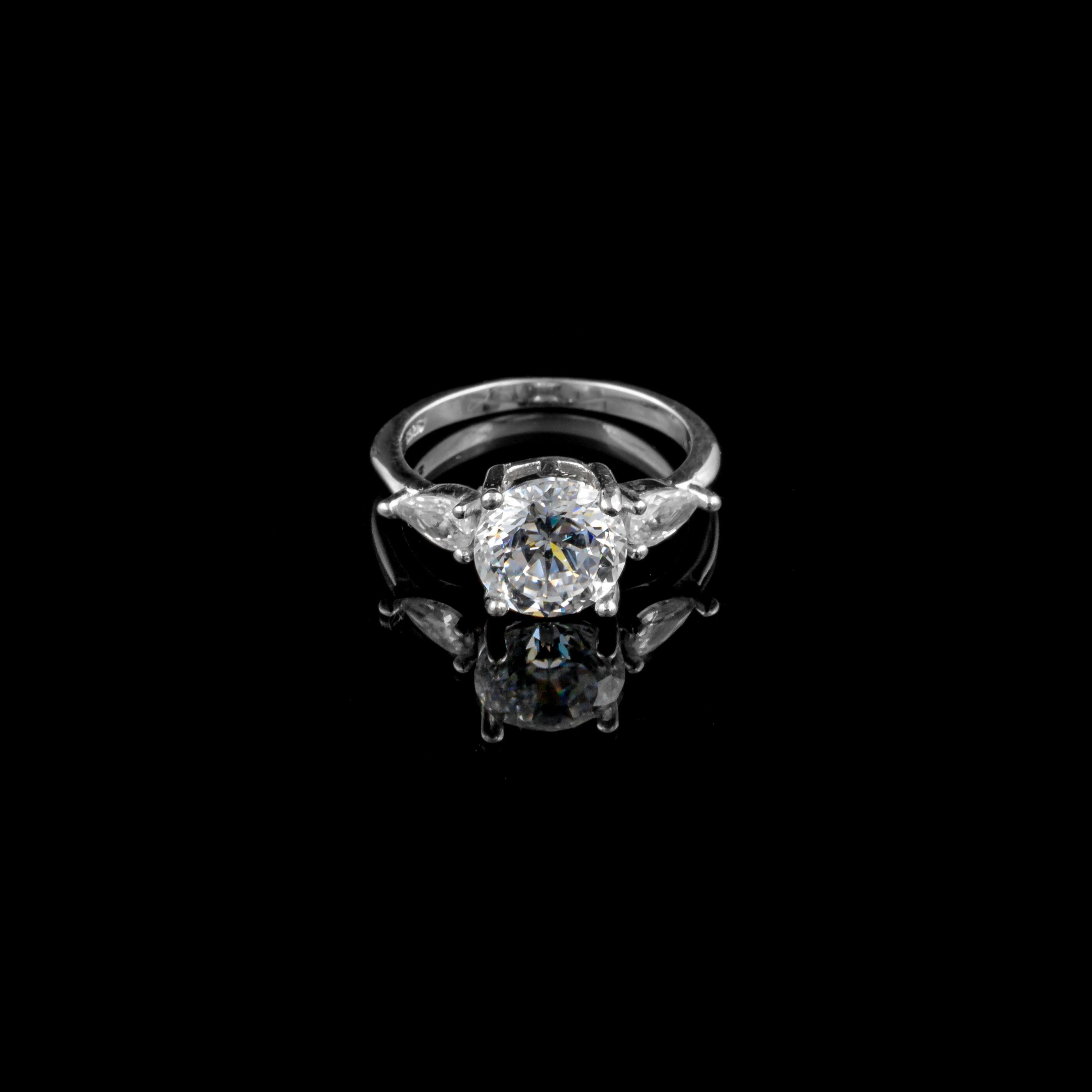 Elegant Diamond Ring with Black Background · Free Stock Photo
