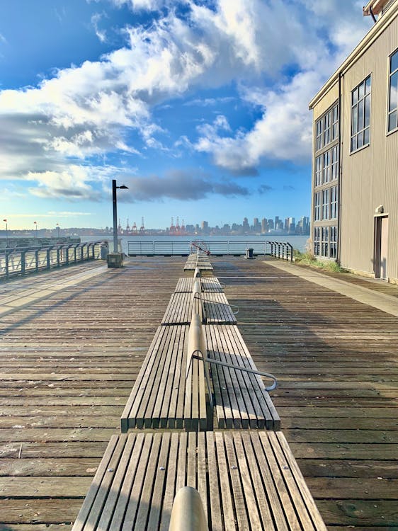 Free stock photo of benches, city skyline, dock