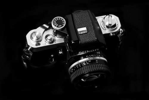 Free Close-up of a classic vintage film camera in monochrome. Artistic composition and lighting. Stock Photo